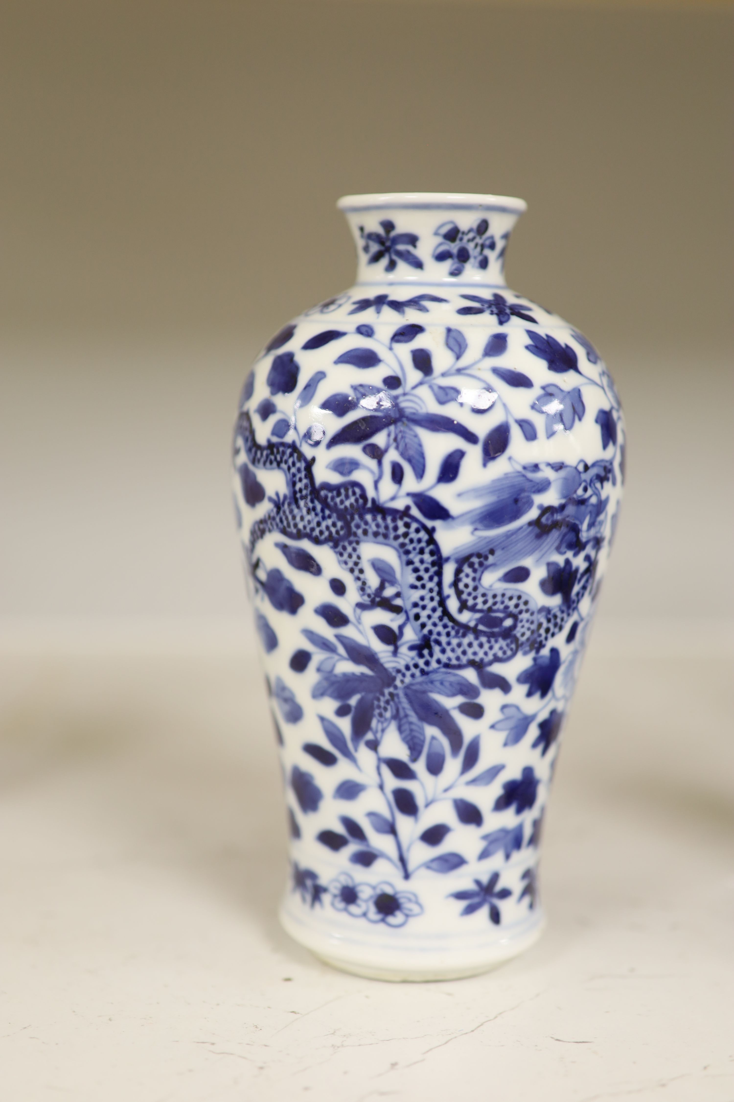 A late 19th century Chinese blue and white dragon vase, height 18cm